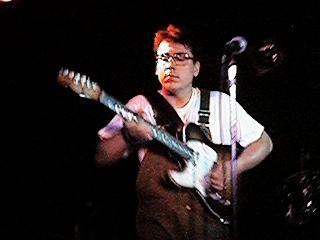 Picture of John Flansburgh in overalls